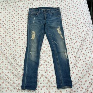Gucci Women’s skinny distressed stretch denim with GG logo